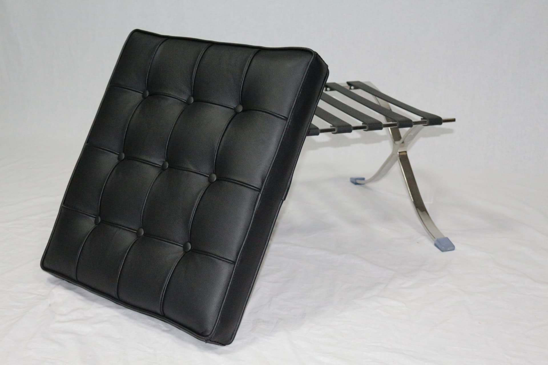 Luxury Mid-Century Black Leather Ottoman
